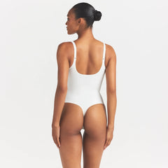 SKIMS BODY UNLINED PLUNGE THONG BODYSUIT | IVORY