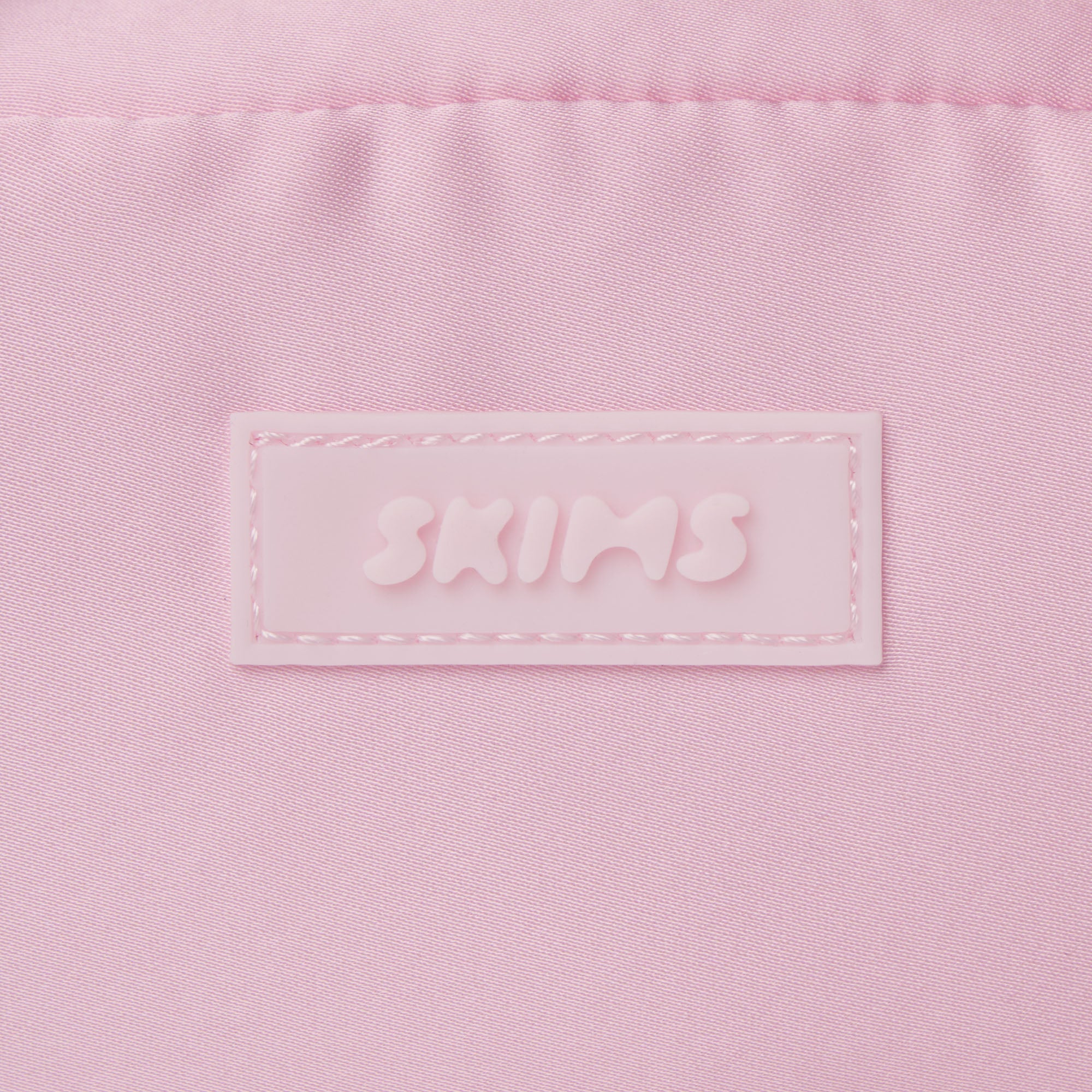 SKIMS ACCESSORIES SATIN MINI DUFFLE BAG | PEONY